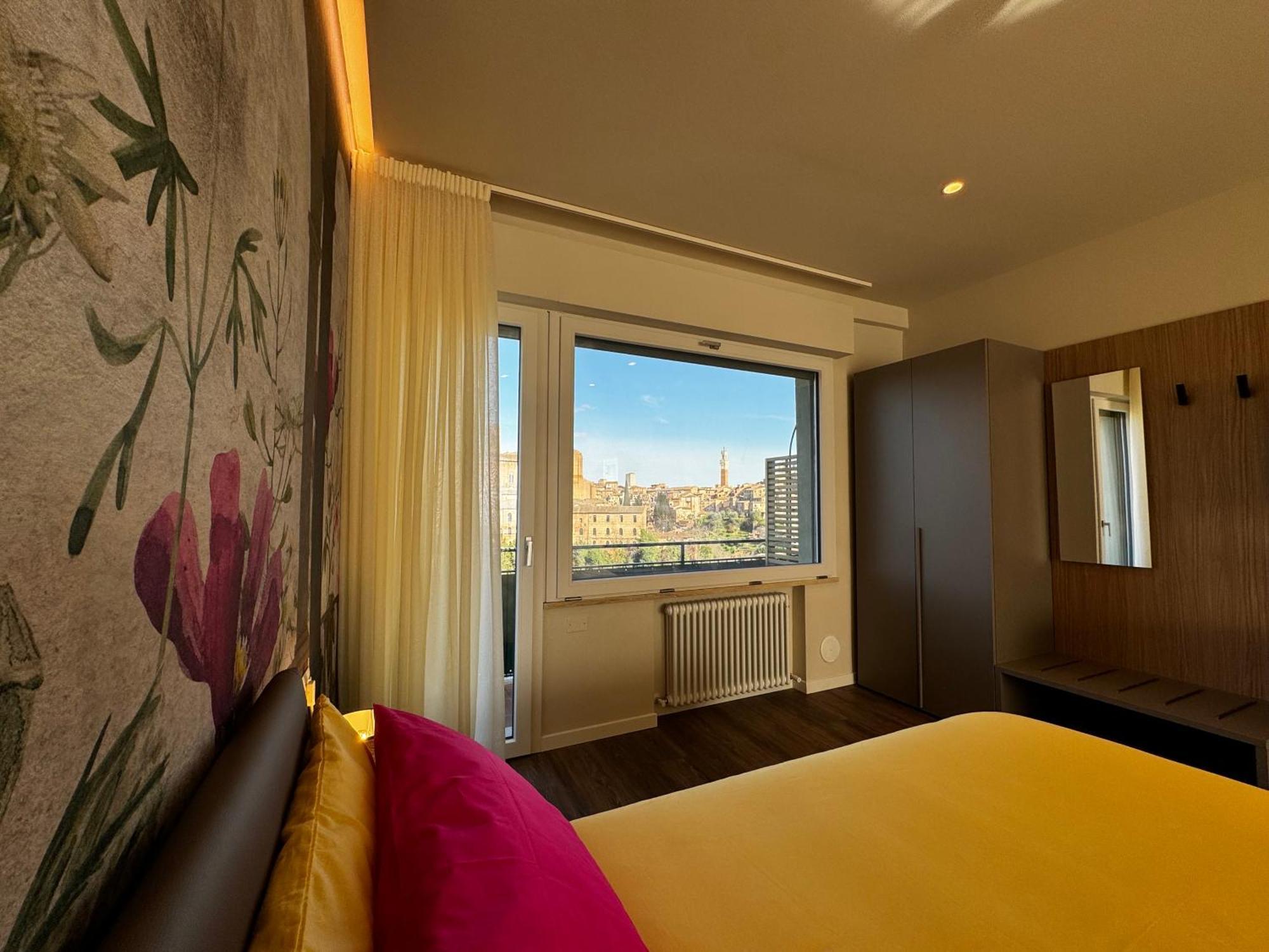 Skyline Siena Apartment Bagian luar foto