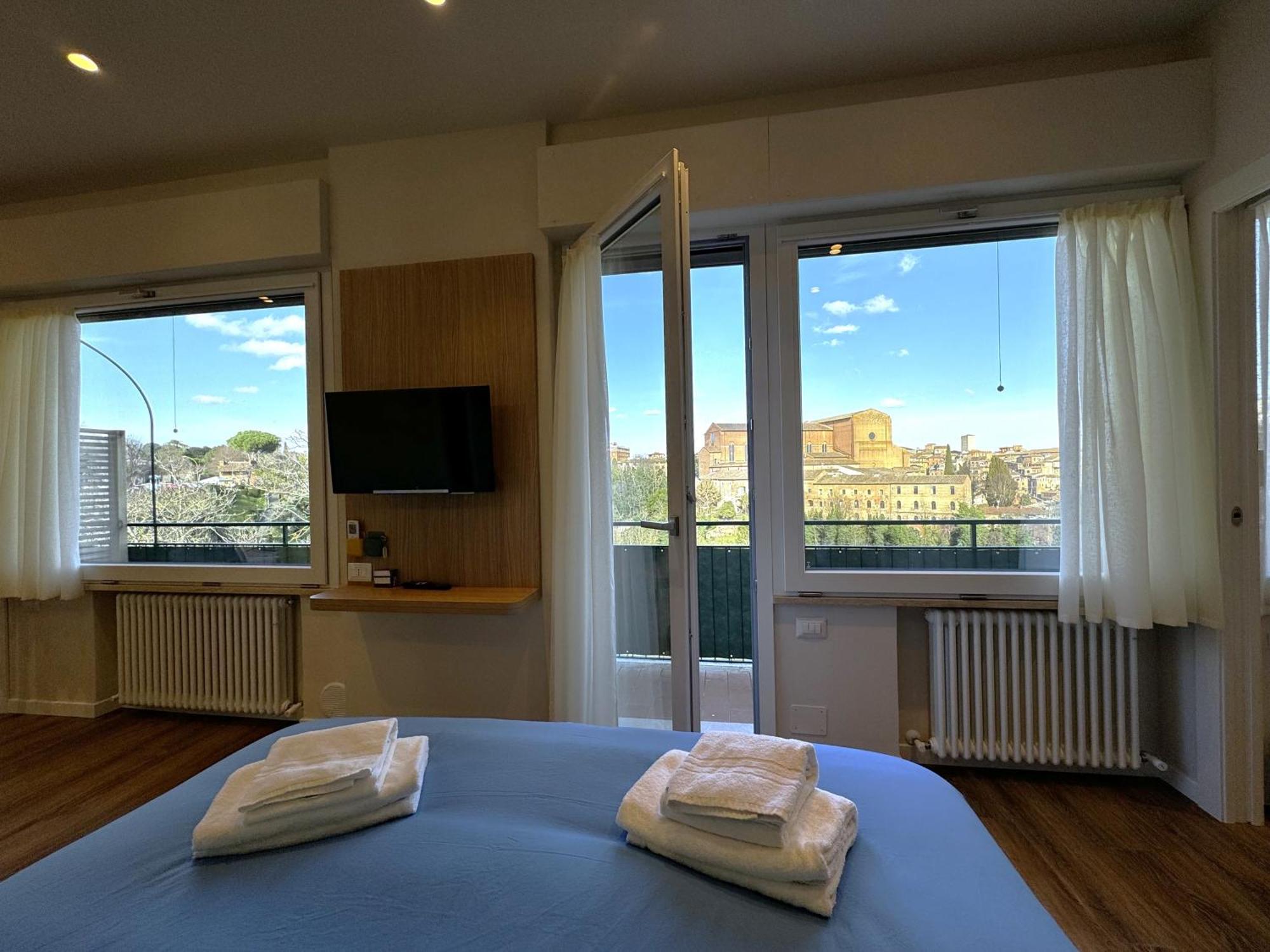 Skyline Siena Apartment Bagian luar foto