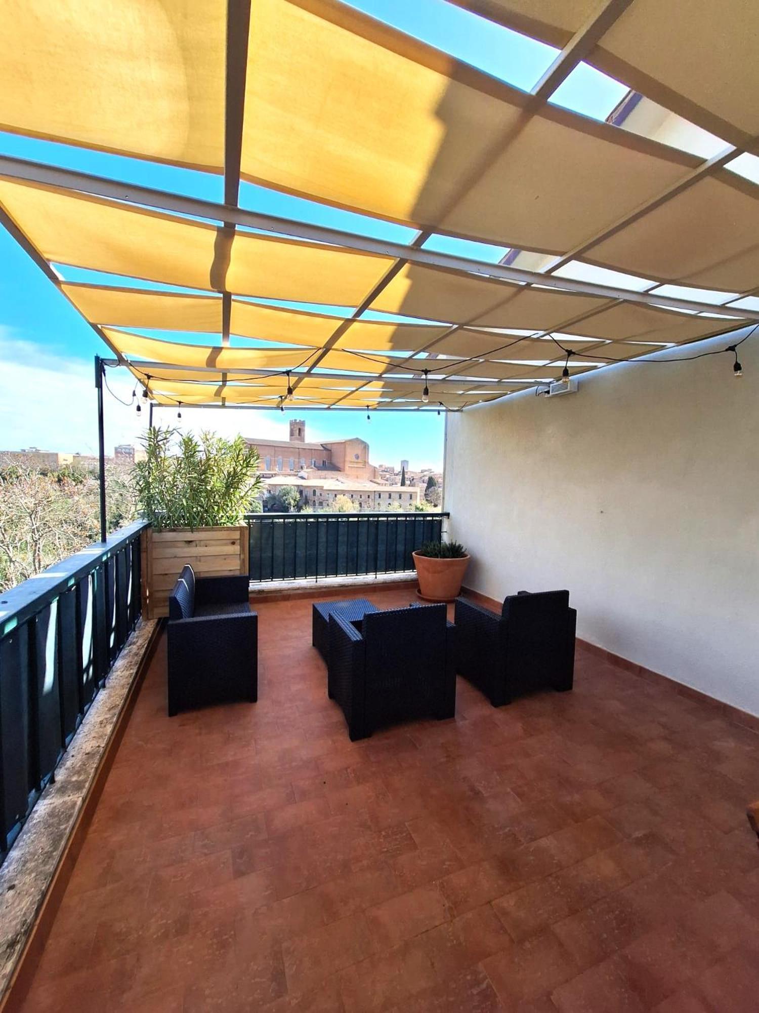 Skyline Siena Apartment Bagian luar foto